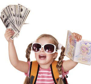 Child holding international passport and money.