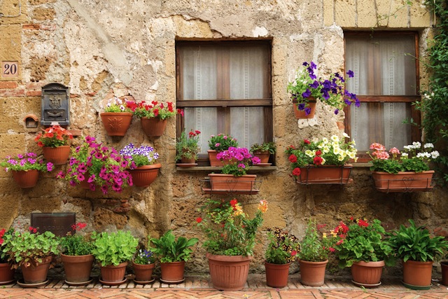 Beautiful street decorated with flowers in Italy
