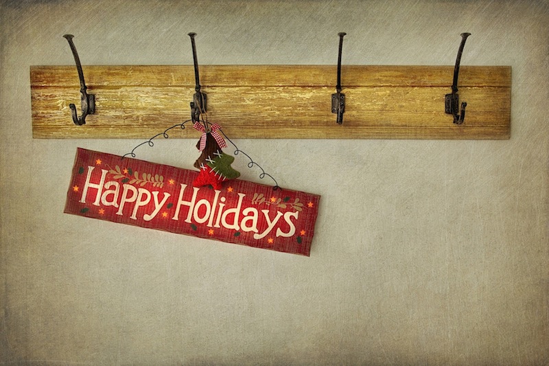 Holiday sign on antique plaster wall